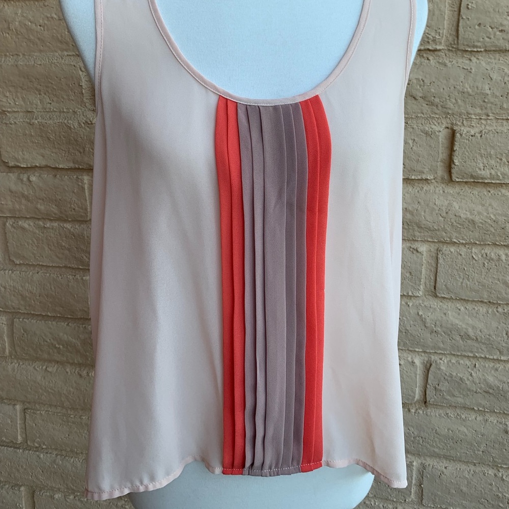 Sheer sleeveless top.